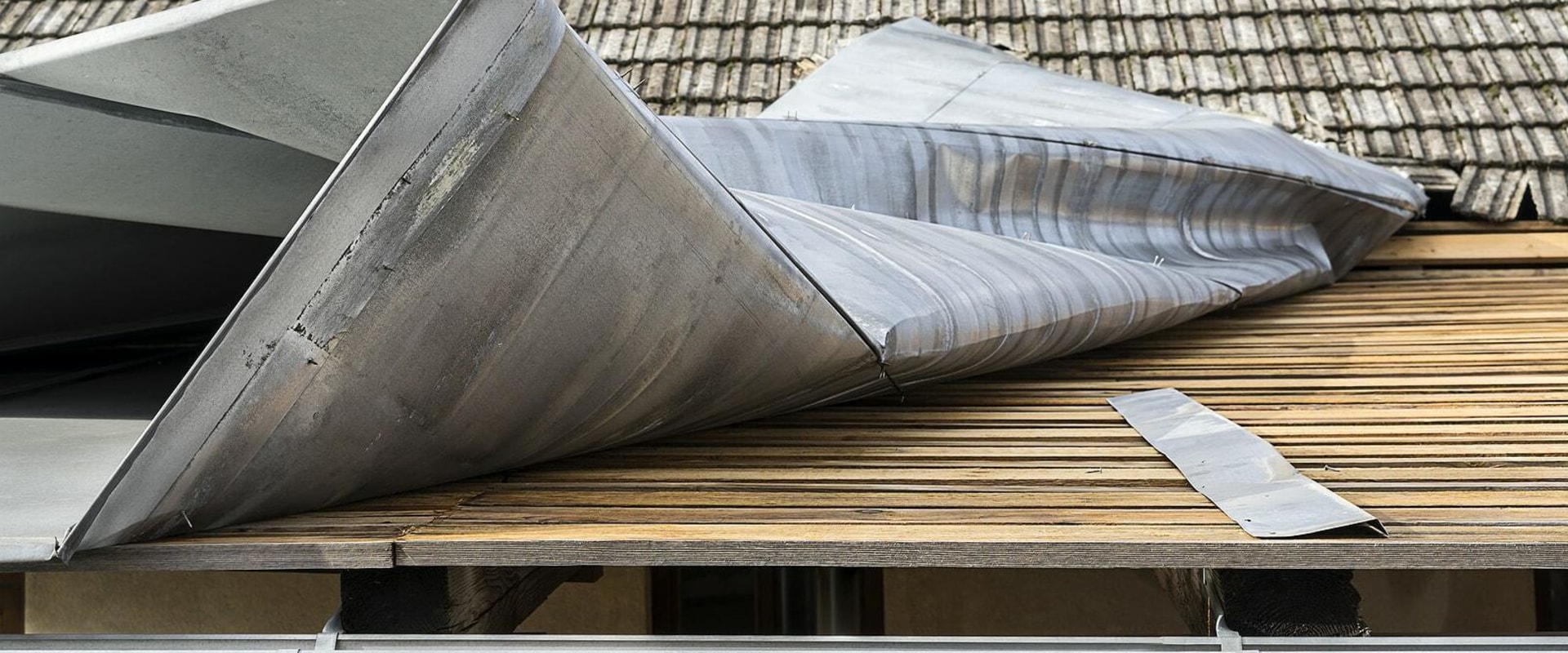 What are the disadvantages of a metal roof?